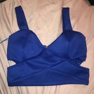 New with tags! Royal blue crop top with cut outs